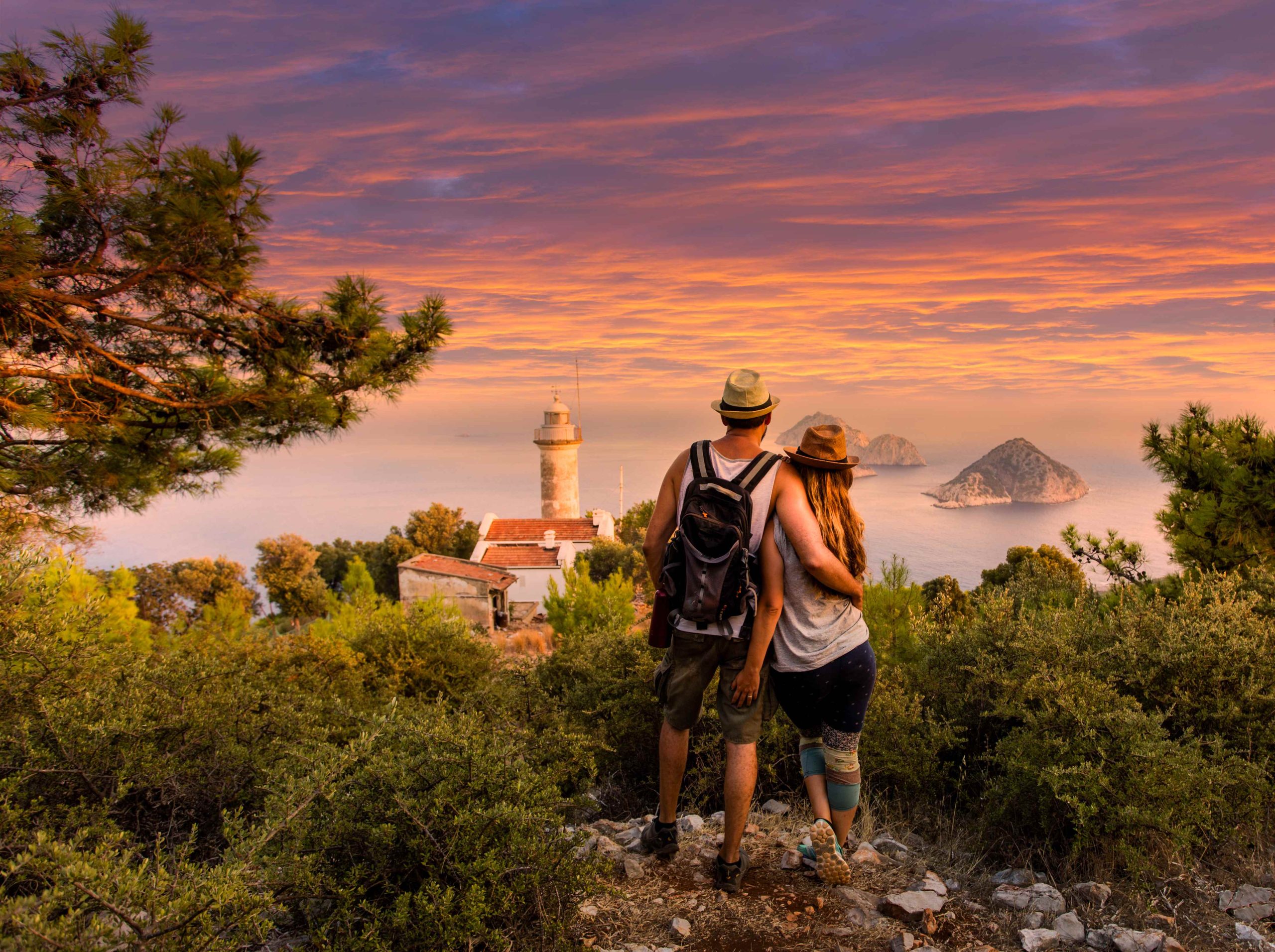 Couple-looking-over-ocean-Lycian-Way-scaled